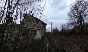 Zdjęcie opuszczonego miejsca: Opuszczony dom z budynkiem gospodarczym