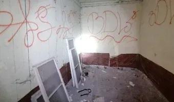 Zdjęcie opuszczonego miejsca: Opuszczony dom z budynkiem gospodarczym