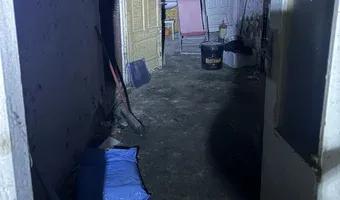 Zdjęcie opuszczonego miejsca: Zarośnięty dom z wyposażeniem