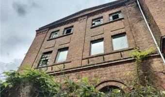 Zdjęcie opuszczonego miejsca: Opuszczony budynek fabryczny.